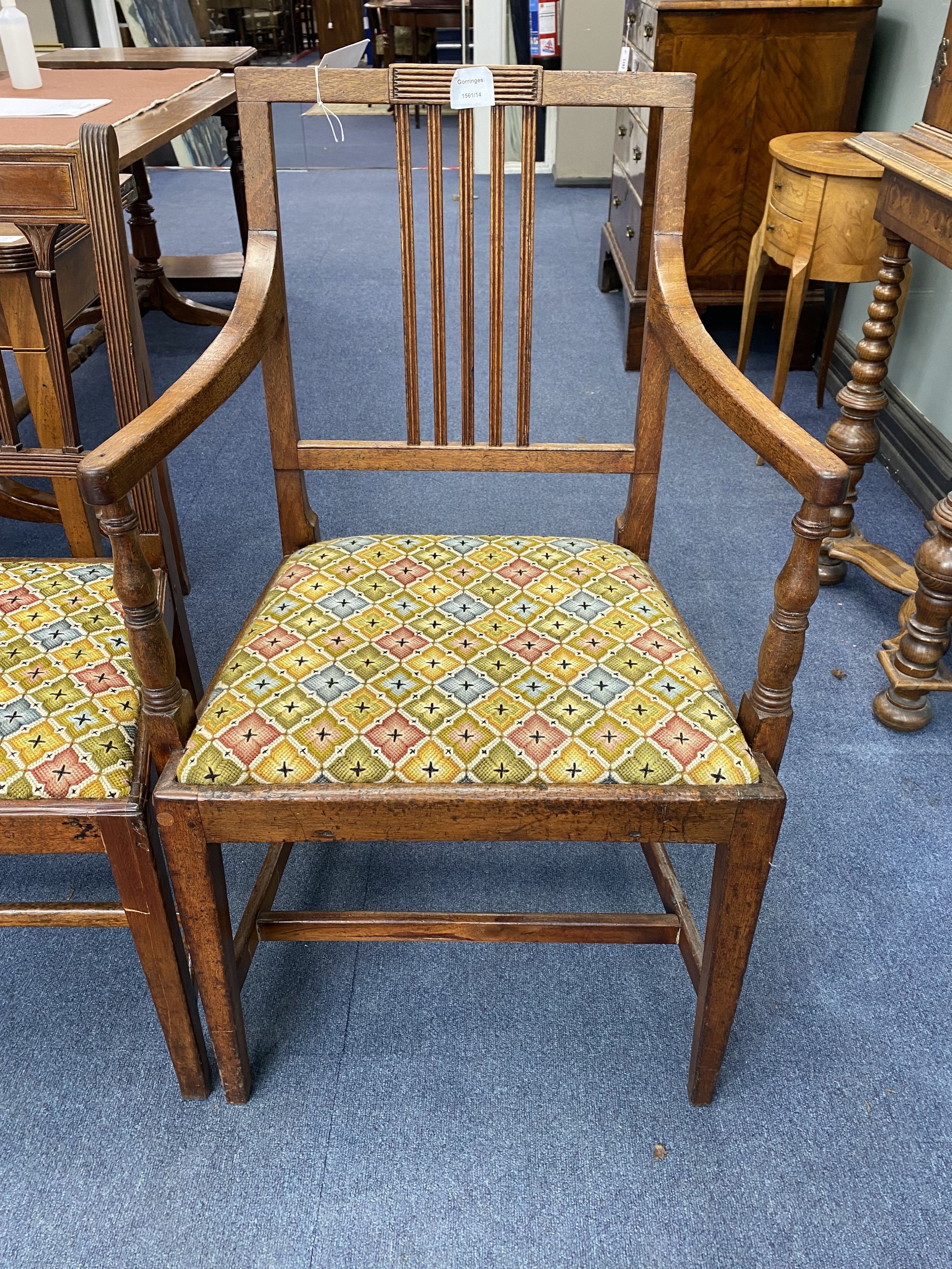 A Regency mahogany elbow chair and three others